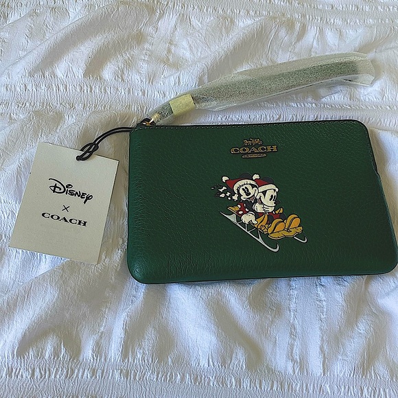 Coach Disney Dark Pine Sledding Santa Mickey and Minnie Small Wristlet - Picture 1 of 6